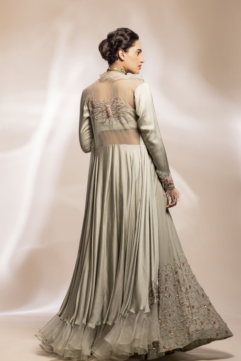 Sage Green Modal Silk Jacket With 3D Motifs And Sheer Ruffle, Paired With Flared Sharara.