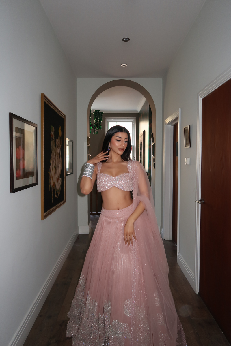 Arch in Blush pink cutwork lehenga