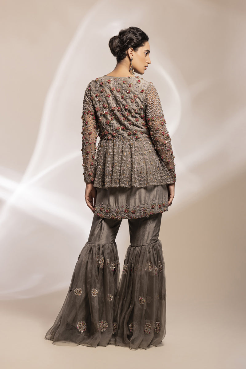 Antique Grey Tulle Peplum Jacket With Embroidered Gharara Ensemble.