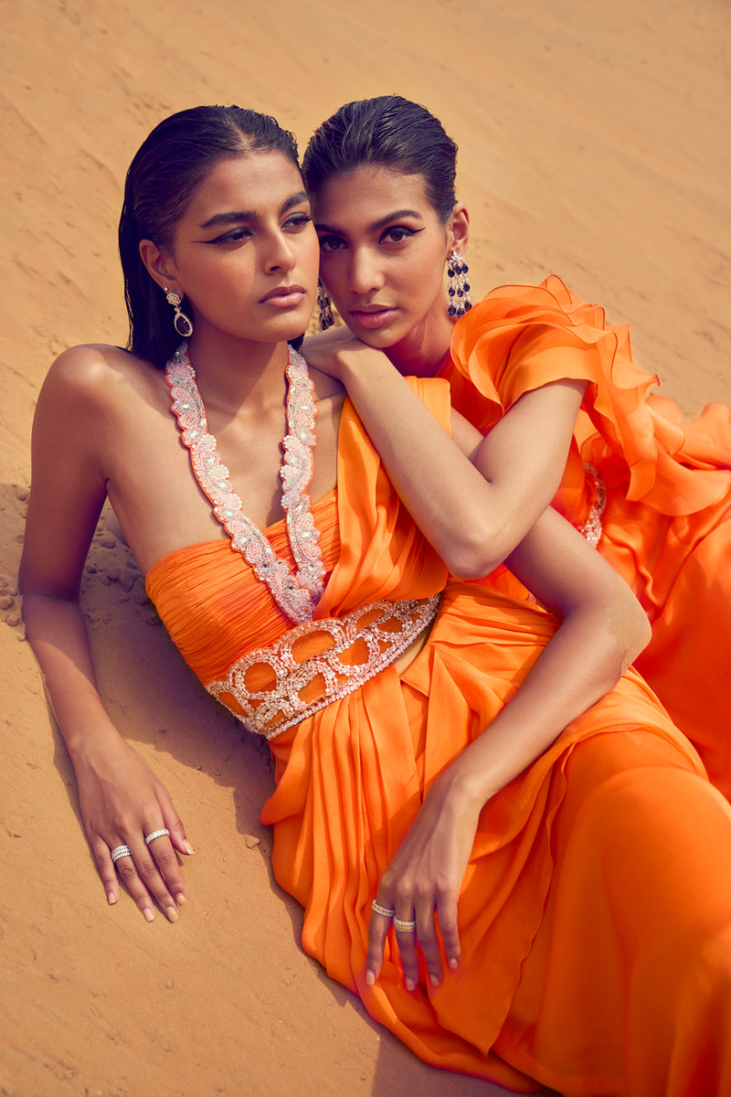 Ruffled Saree With A Halter Neck Blouse