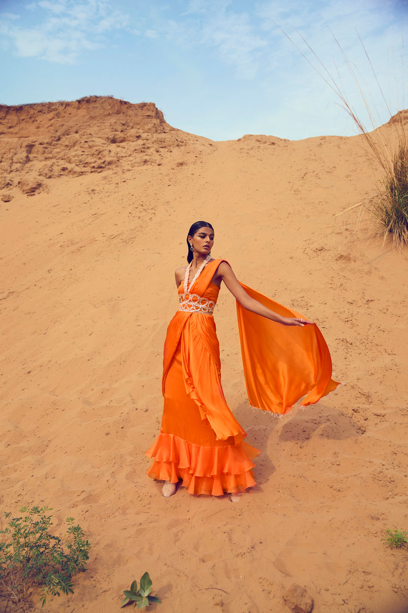 Ruffled Saree With A Halter Neck Blouse