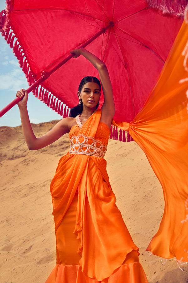 Ruffled Saree With A Halter Neck Blouse