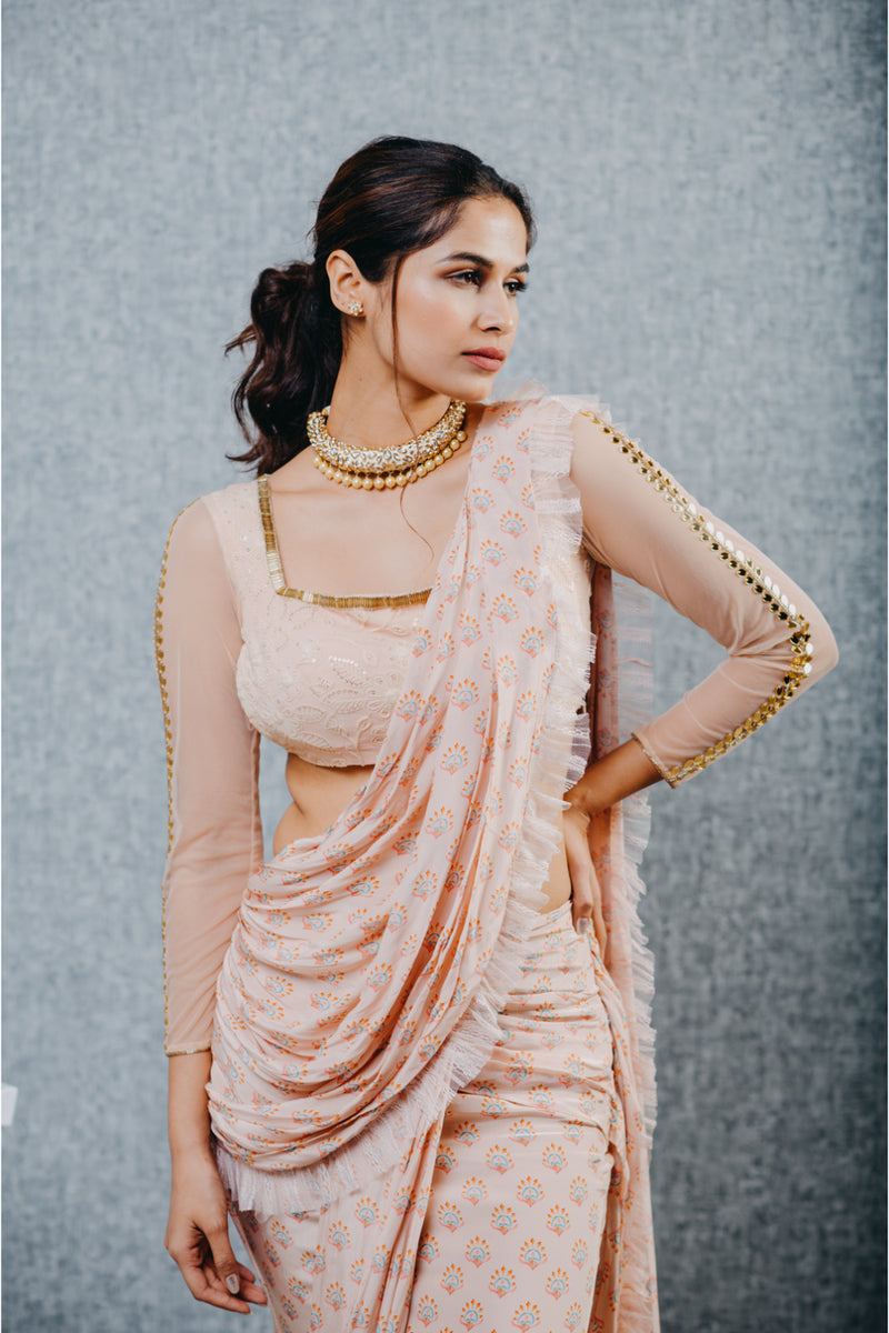 Peach print draped saree and embroidered blouse set