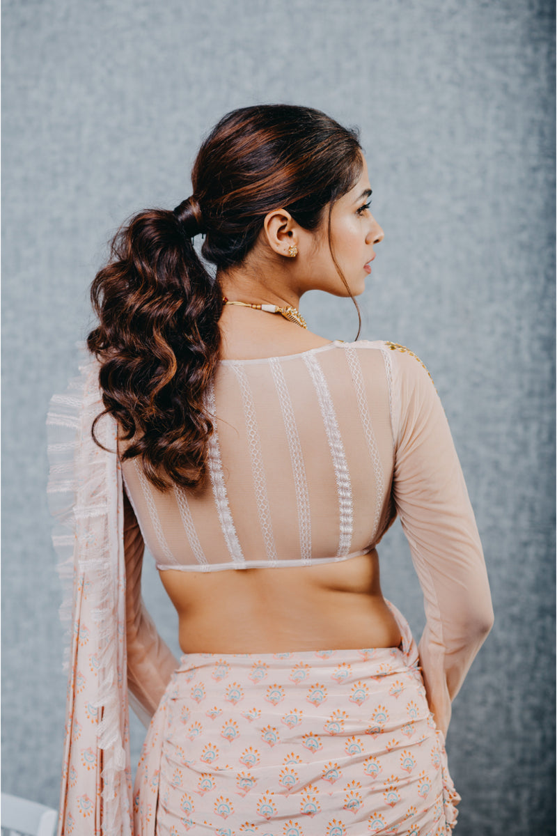 Peach print draped saree and embroidered blouse set