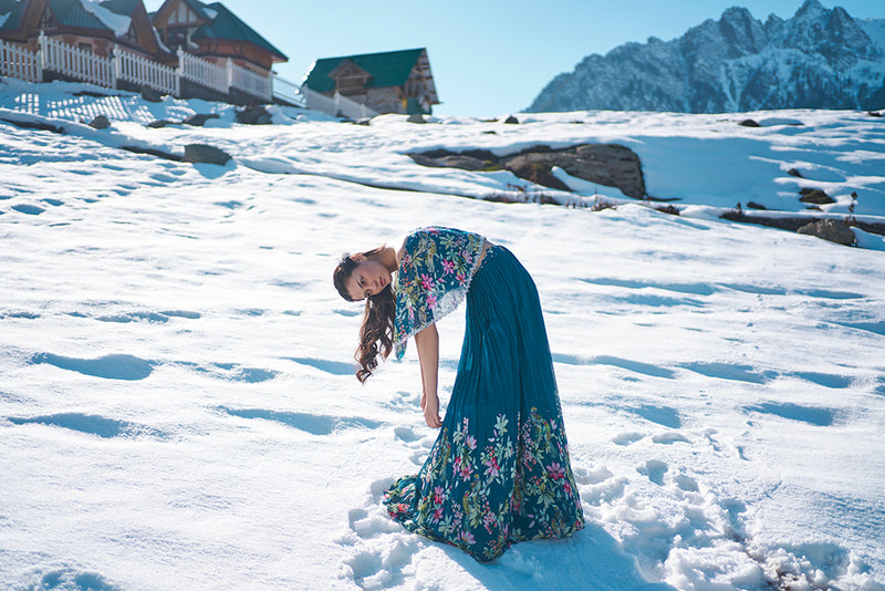 navy blue floral hand emdroiderd off sholulder cape blouse with pleated lehanga made in georgette fabric