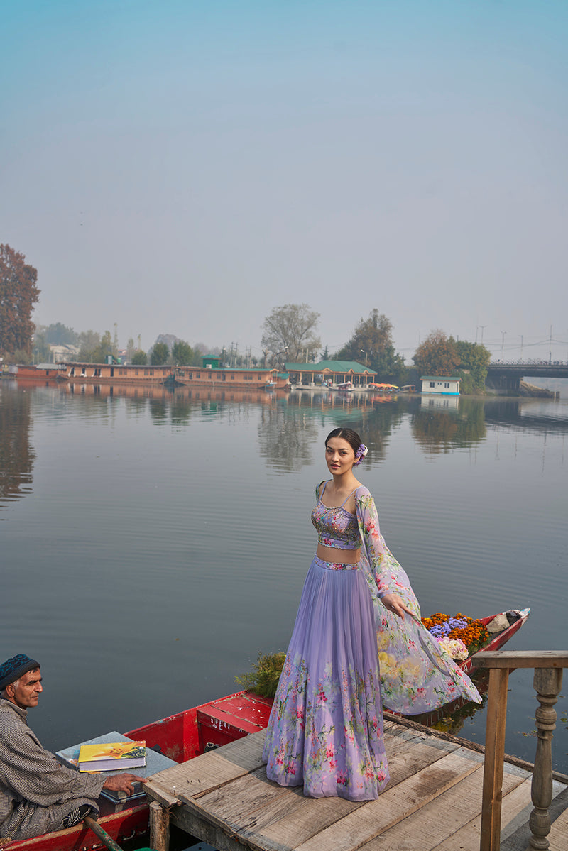 lilac floral hand emdroiderd bustier blouse with pleated lehanga and a choker dupatta made in georgette fabric