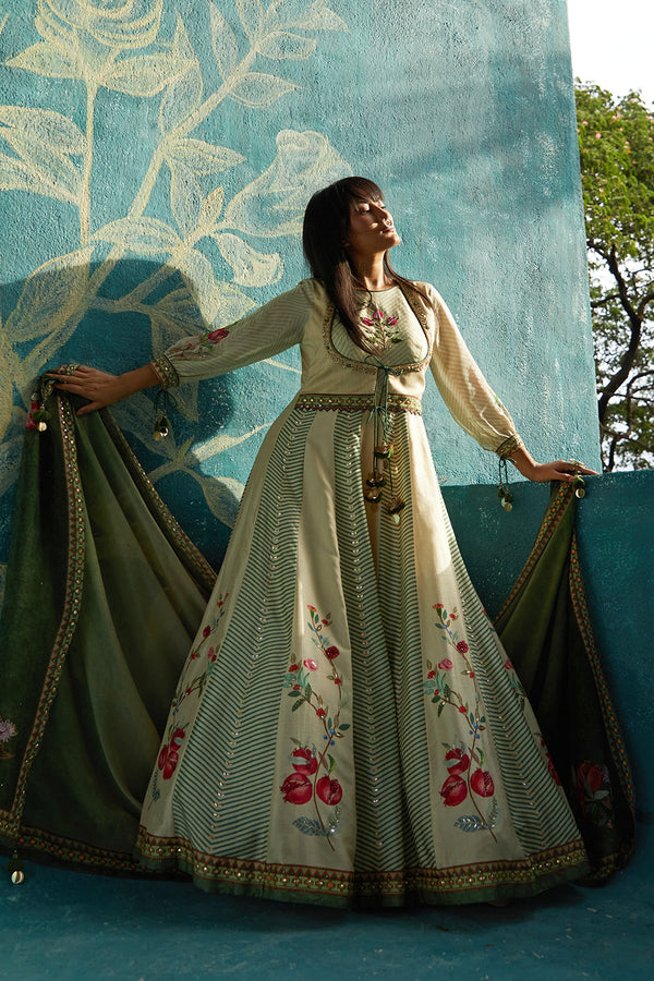 Beige printed gown embellished neckline ,tassel,and bow detailing ,chiffon sleeves and highlighted organza dupatta.
