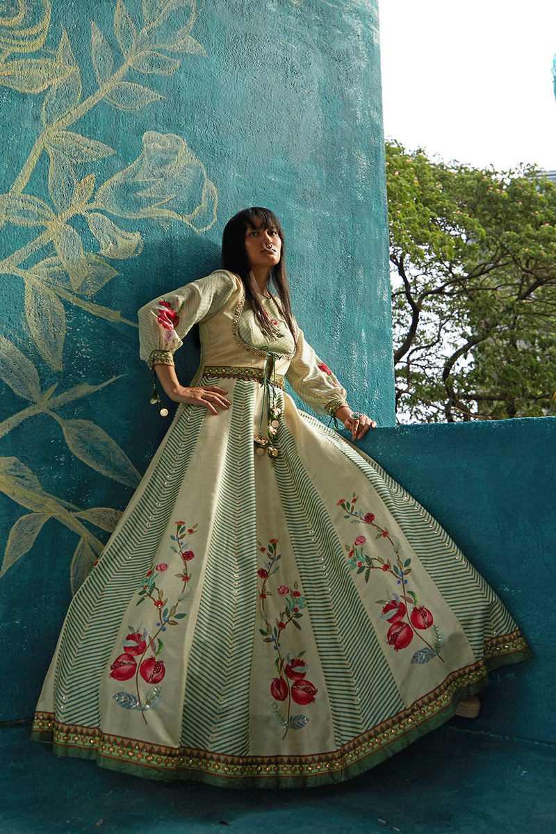 Beige printed gown embellished neckline ,tassel,and bow detailing ,chiffon sleeves and highlighted organza dupatta.