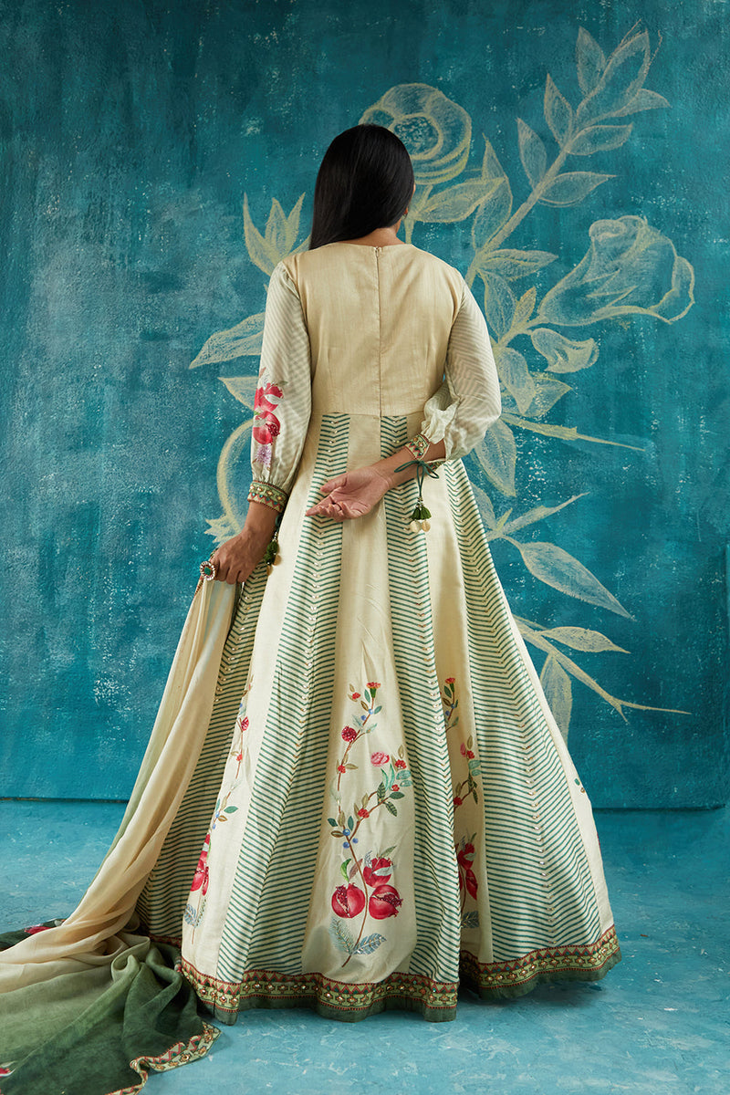 Beige printed gown embellished neckline ,tassel,and bow detailing ,chiffon sleeves and highlighted organza dupatta.