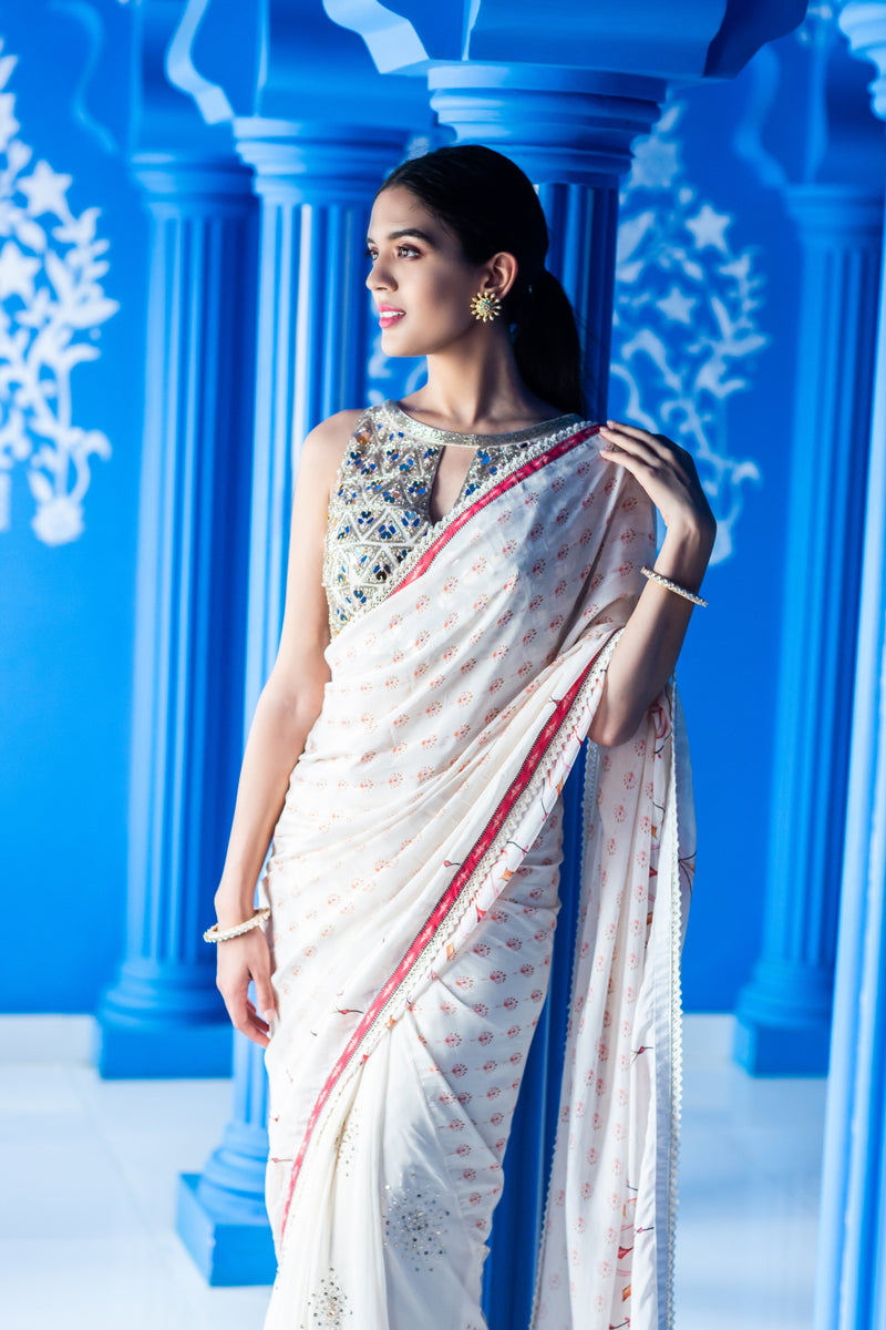 Ivory printed saree with embroidered blouse