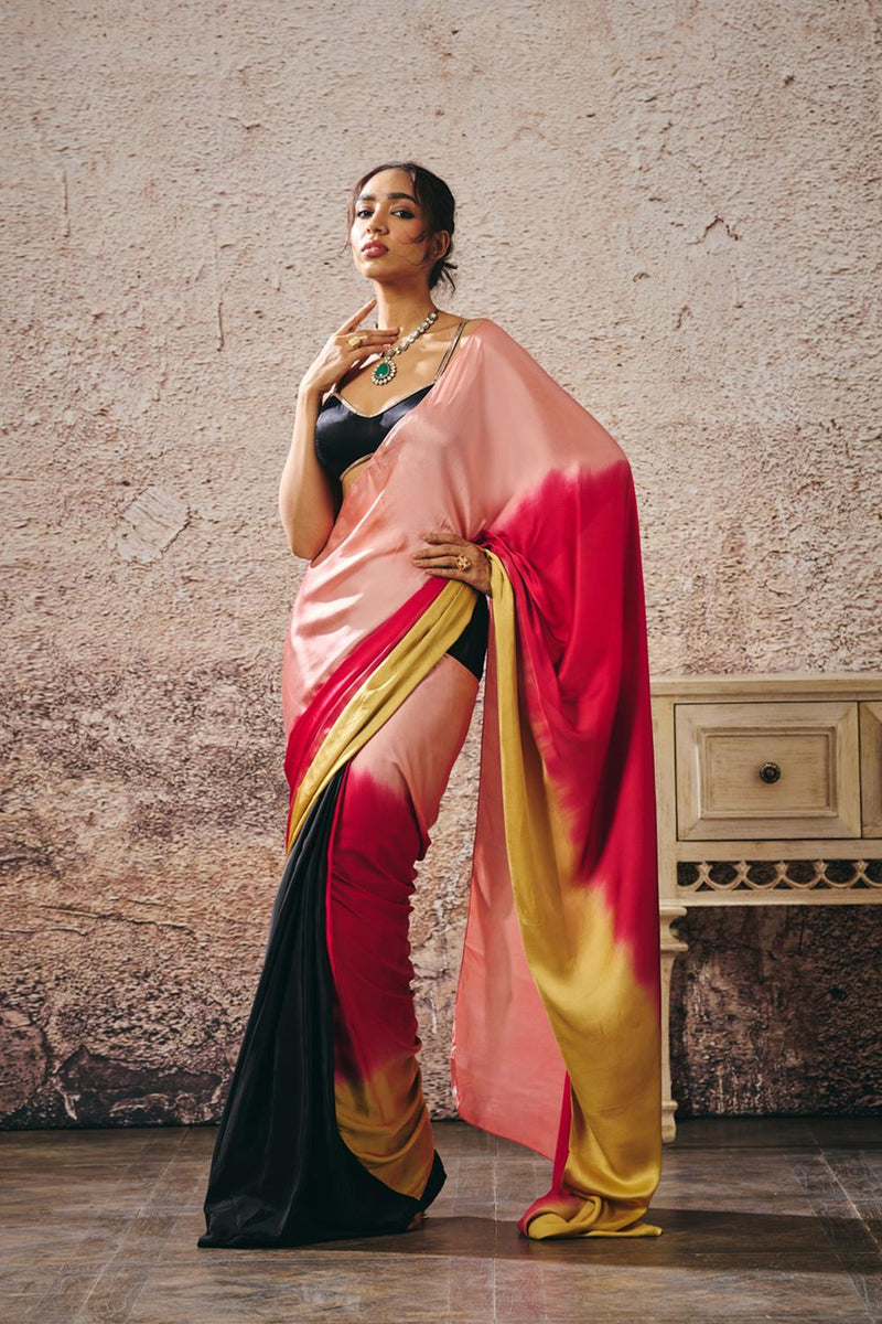 Black Blouse With Black And Red Peach Gold Ombre Saree