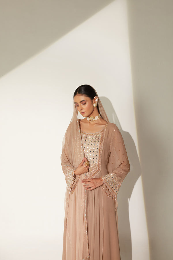 High low front gathered tunic paired with gathered sharara and ombre dupatta