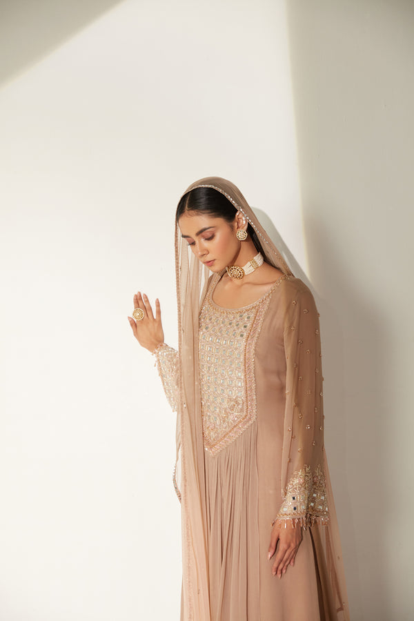 High low front gathered tunic paired with gathered sharara and ombre dupatta