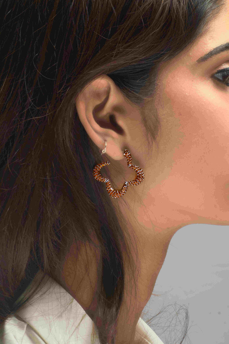 Hoops With 
Orange Prong Set Crystals