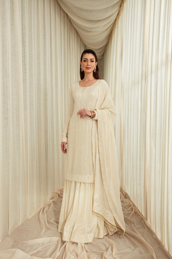 Ivory Dori Work And Sequins Suit Paired With Ivory Chevron Sequins Garara And Georgette Light Chikankari Dupatta.