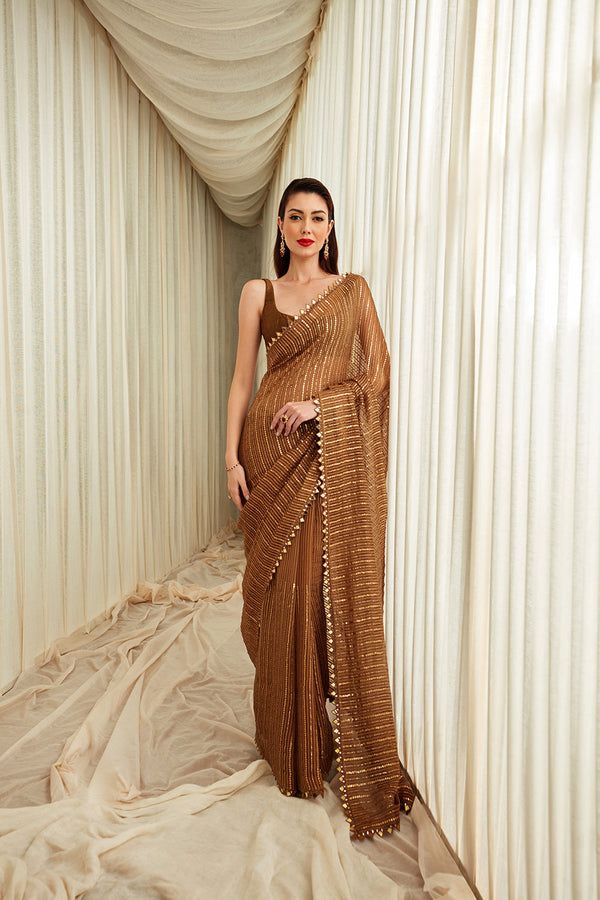 Dark Gold Gicha Organza Saree With Sequins Work Paired With Silk Blouse And Petticoat