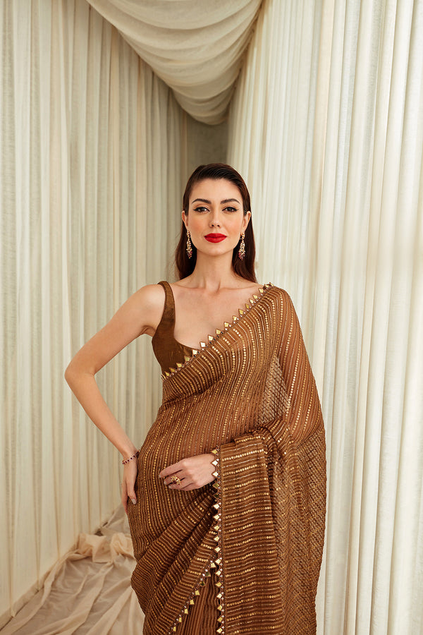 Dark Gold Gicha Organza Saree With Sequins Work Paired With Silk Blouse And Petticoat