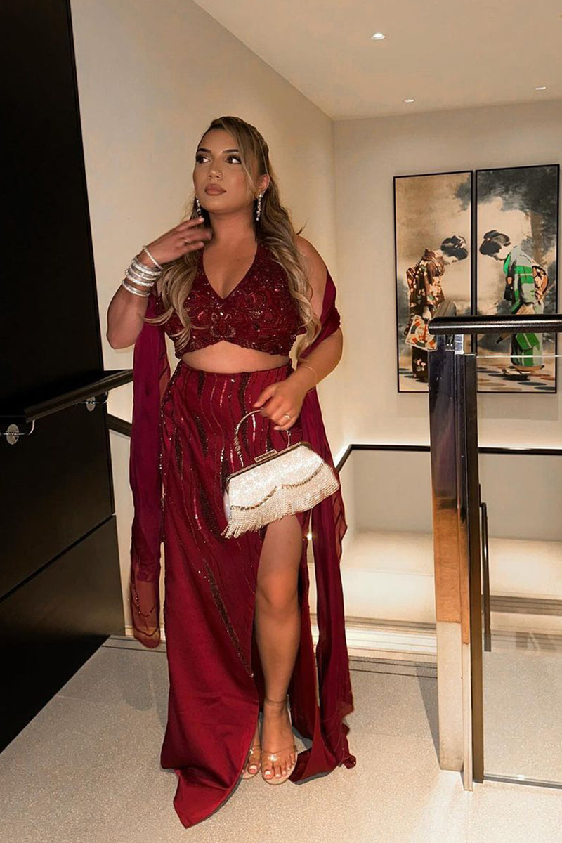 Kajal in Burgundy Halter Top And Skirt Set