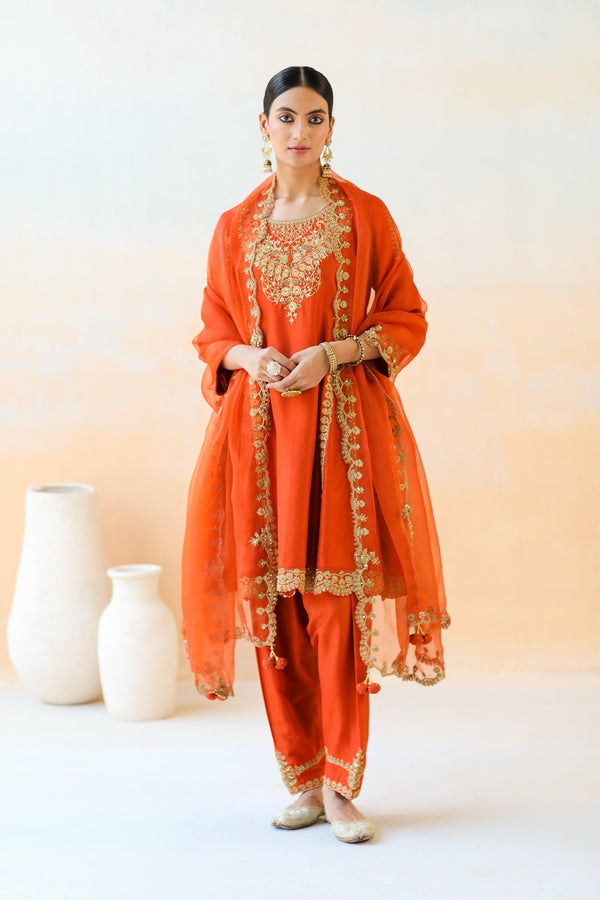 Featuring a Fire Rust Kurta Set with Salwar