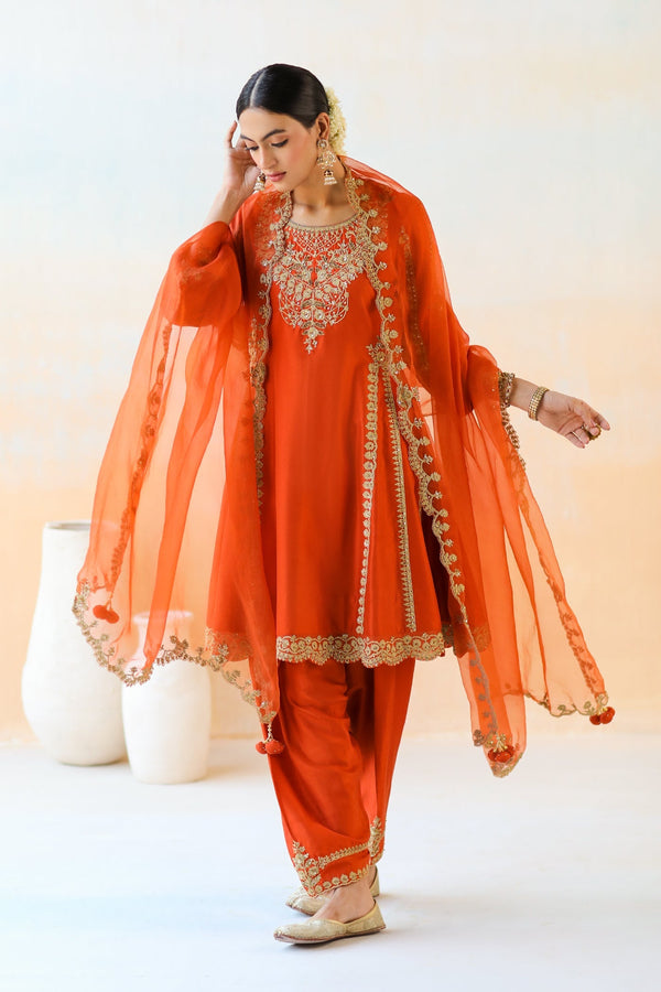 Featuring a Fire Rust Kurta Set with Salwar