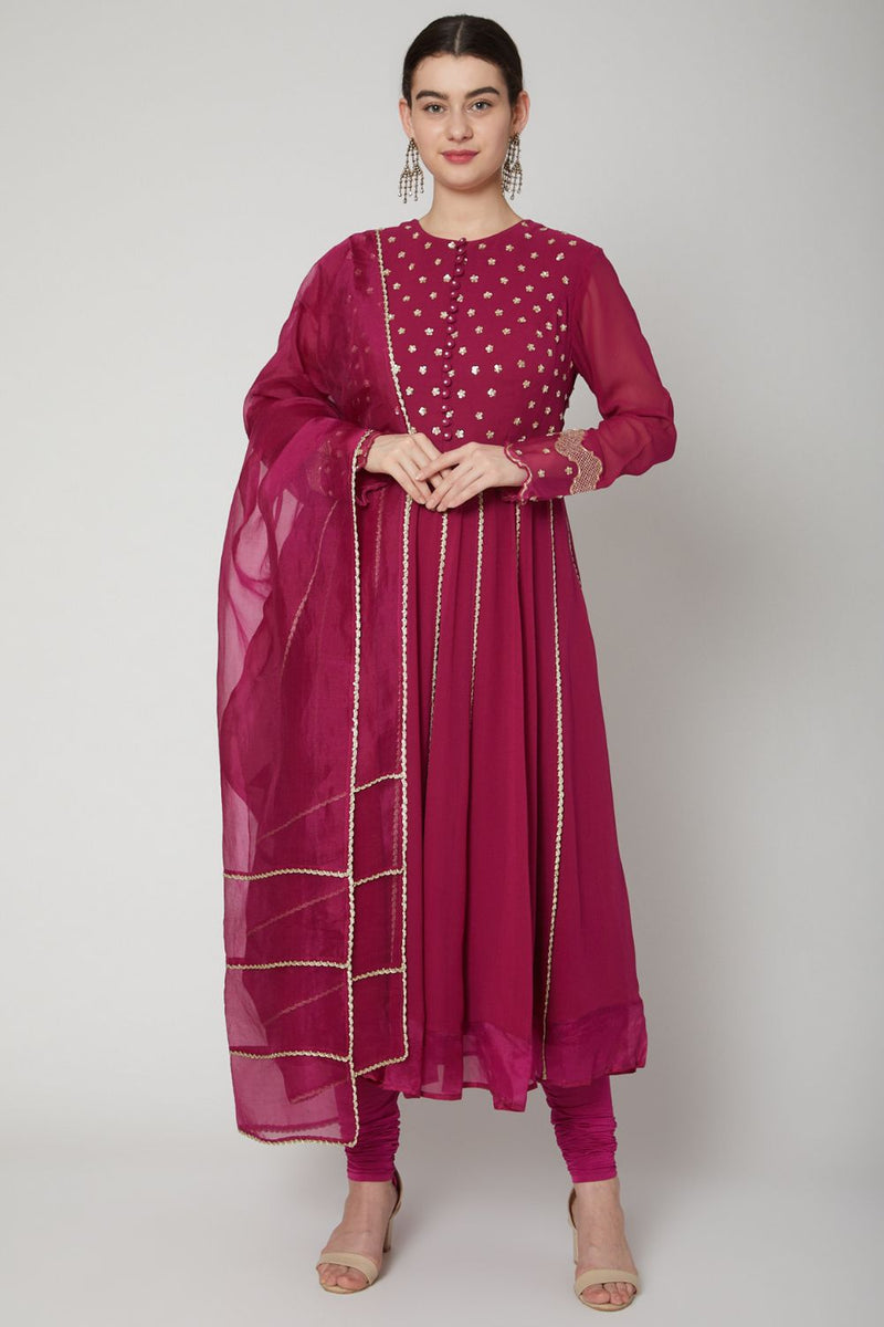 Dark maroon anarkali suit in silk with embroidered neckline and butti