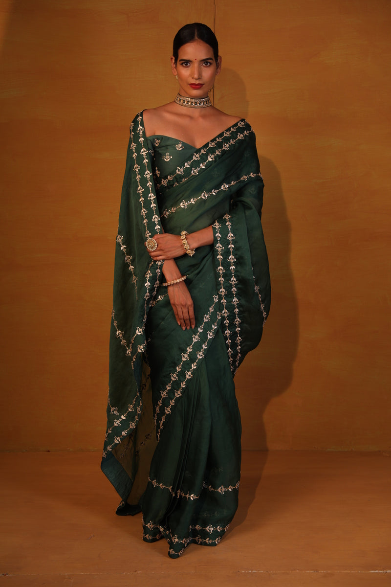 Dark green organza saree