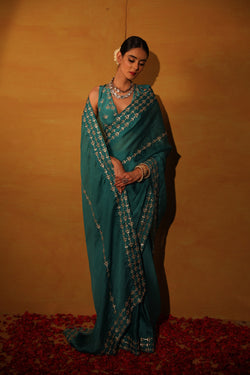 Teal green organza saree