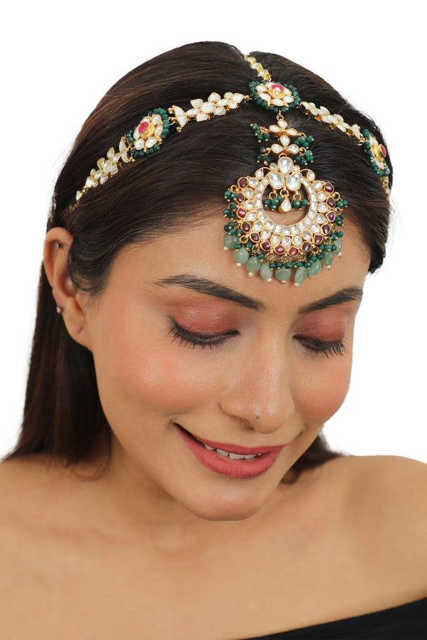 FLORAL MATHAPATTI WITH A LITTLE PINK AND EMERALD GREEN BEADS