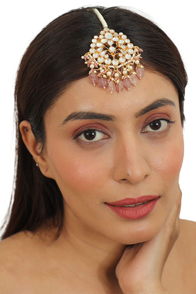TIKKA WITH PASTEL PINK BEADS AND A STRING OF PEARLS