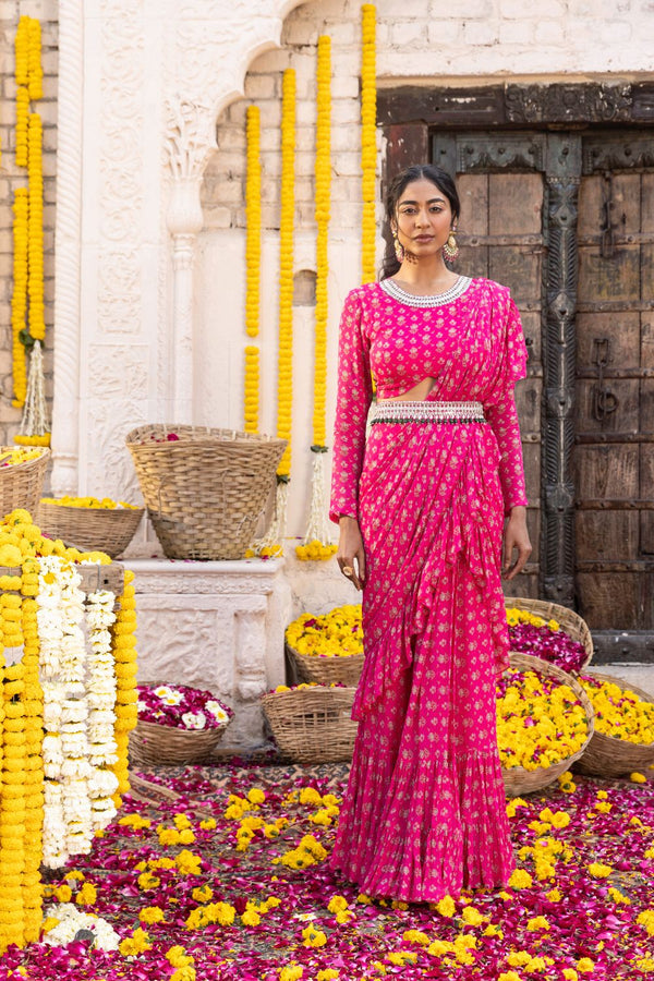 Hot pink printed frill saree with full sleeeve blouse and embroidered belt