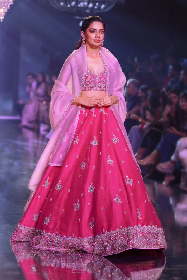 Fuschia Rose Lehenga Choli With Hand Embroidered Buttis In Embossed Embroidery