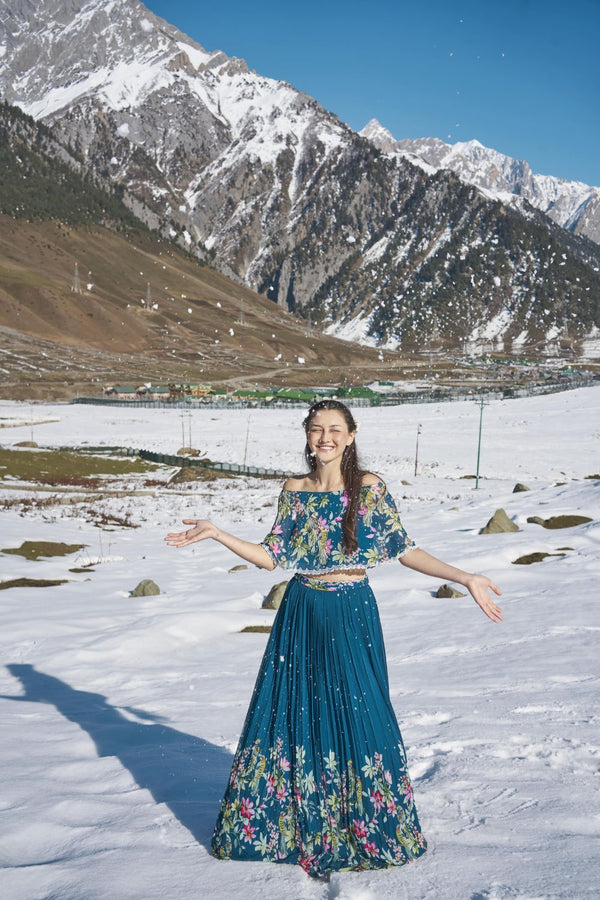 navy blue floral hand emdroiderd off sholulder cape blouse with pleated lehanga made in georgette fabric