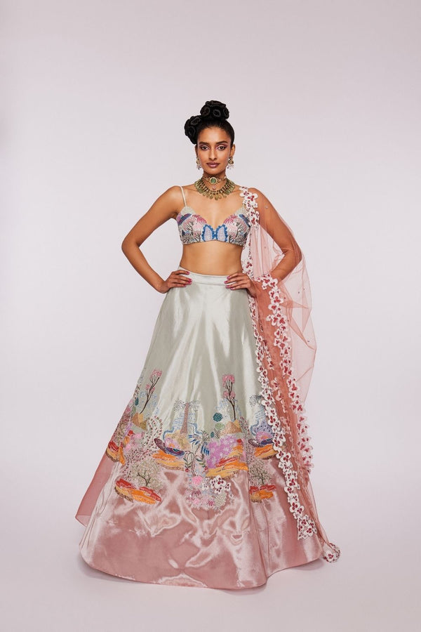 Ivory /Peach Divergence Tissue appliqued and embellished MK lehenga with blouse and  net floral dupatta