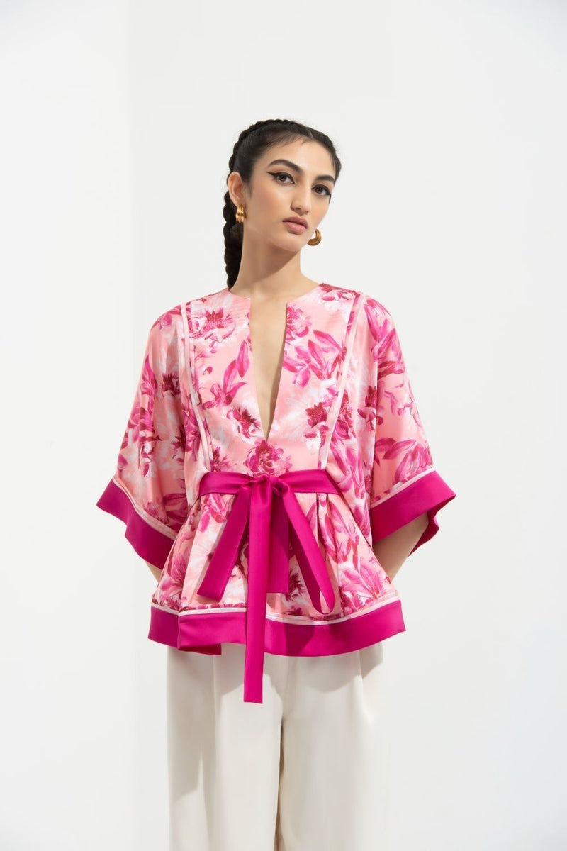 Sakura printed peplum top with kimono sleeves paired with ivory pants