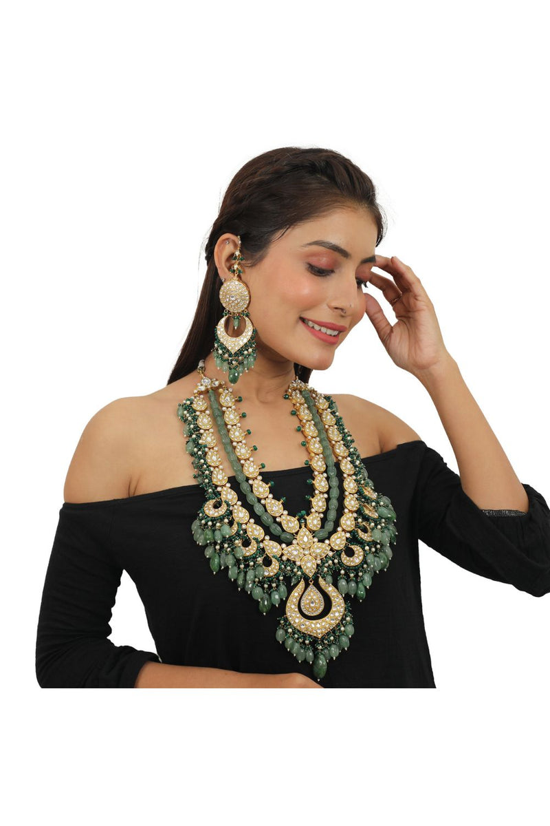 BRIDAL DOUBLE LAYERED NECKLACE IN 22KT GOLD PLATING, STUDDED WITH WHITE JADTAR STONES AND BEADED IN EMERALD AND SEA GREEN PEARLS