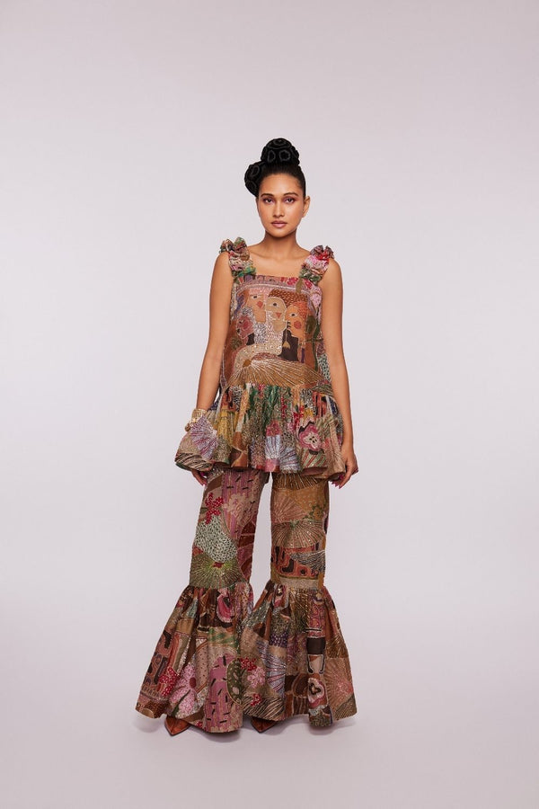 Yellow Divergence Printed and embellished organza sharara set and net floral dupatta