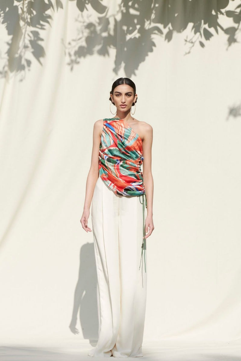 Draped One Shoulder Top Paired With An Ivory Pallazo