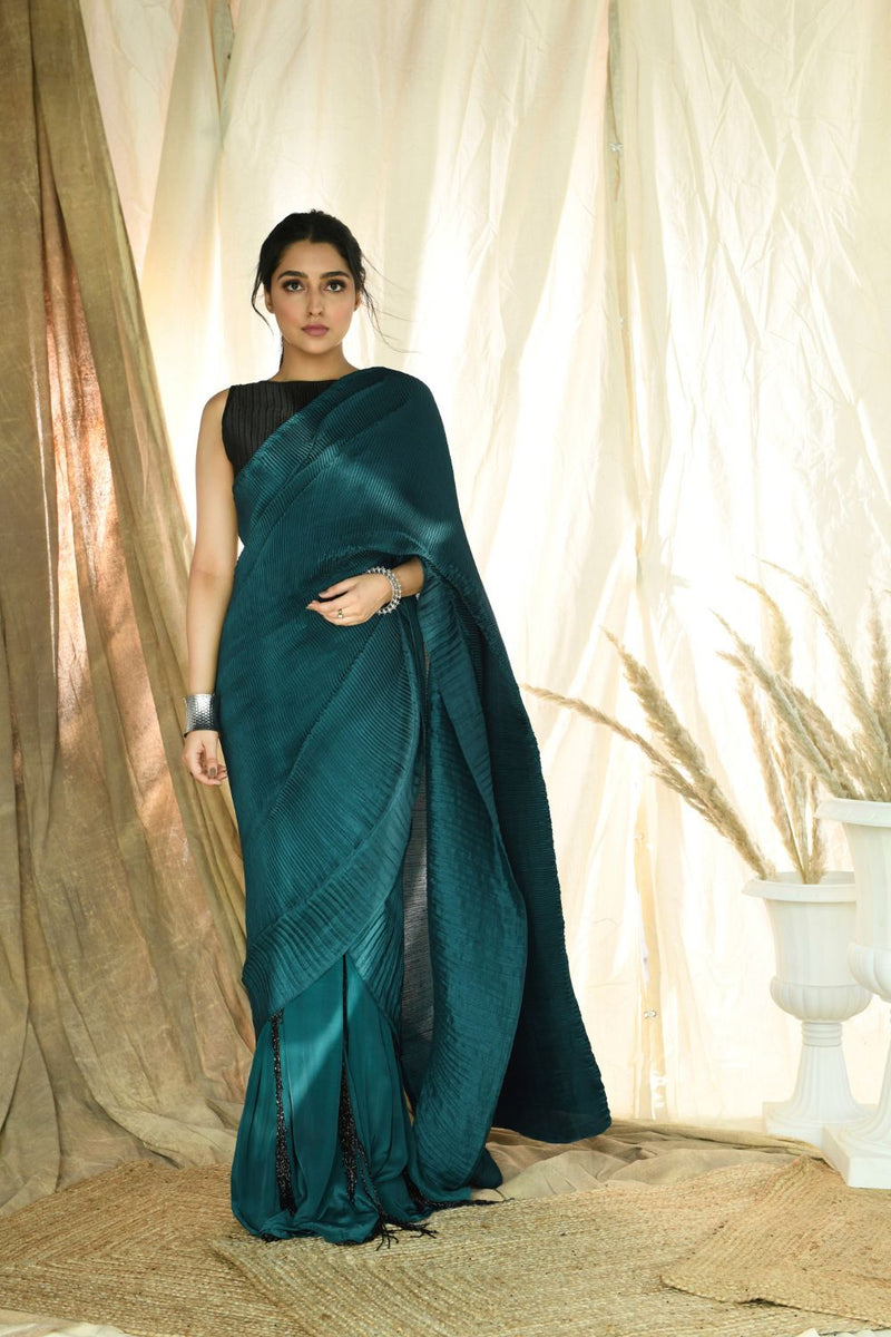 Teal pleated fringe saree with pleated embroidered blouse
