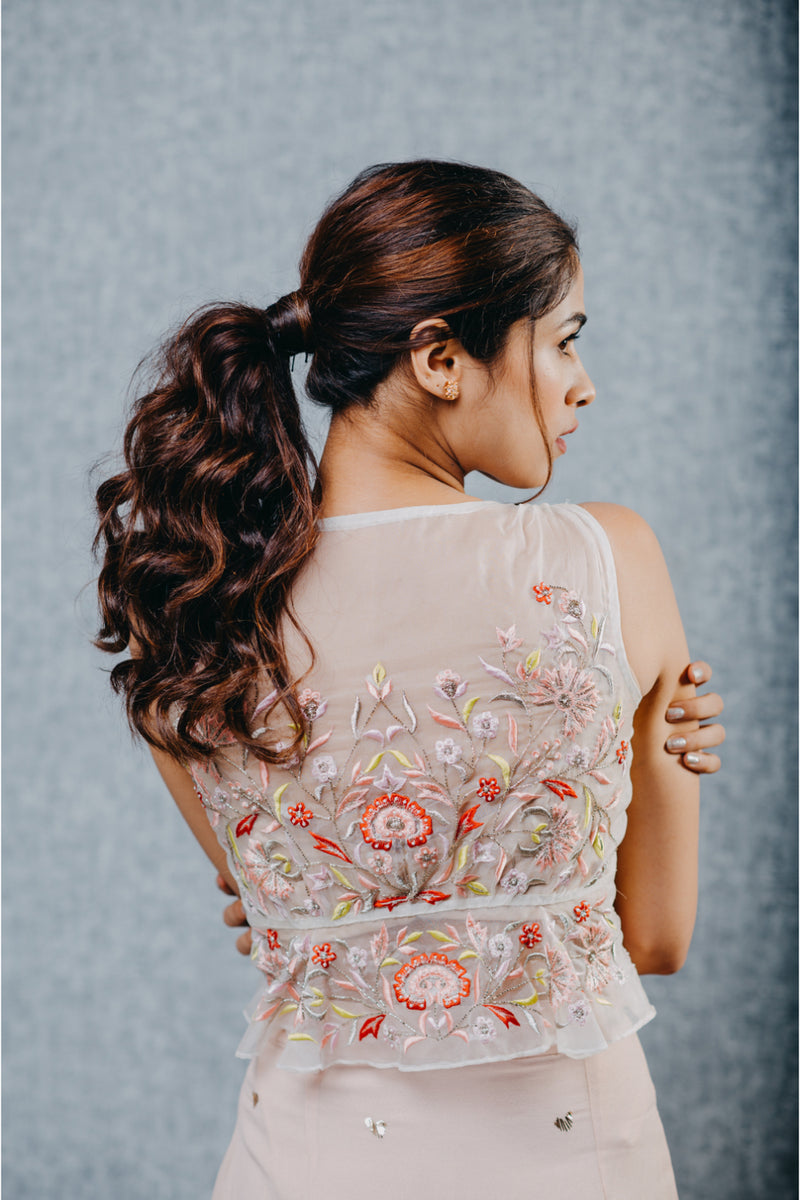 Peach draped skirt with embroidered peplum top
