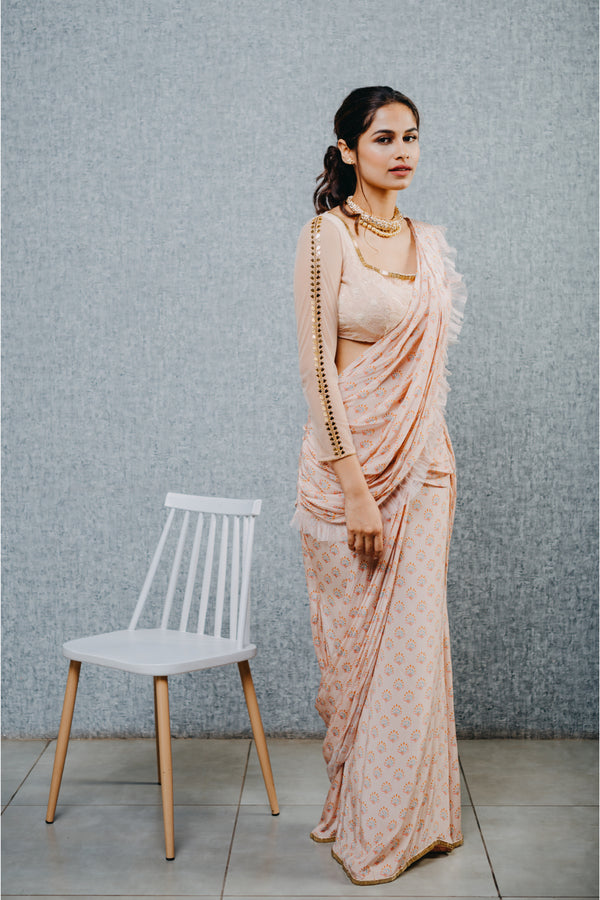 Peach print draped saree and embroidered blouse set