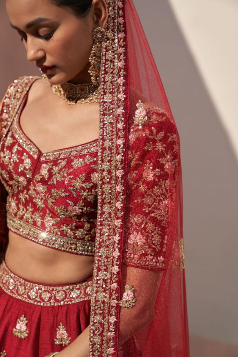 Maroon and peach embroidered Lehenga choli with embellished dupatta