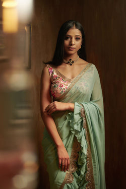 Peach Blouse with Sea Green Saree