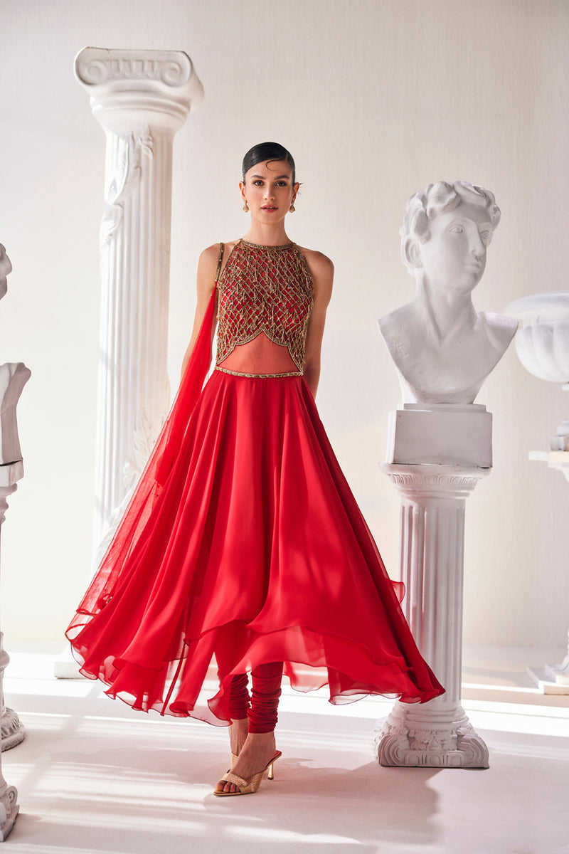 Red Georgette High Low Anarkali Designed With An Emroidered Bodice Paired
 With A Churidar And A Net Dupatta.