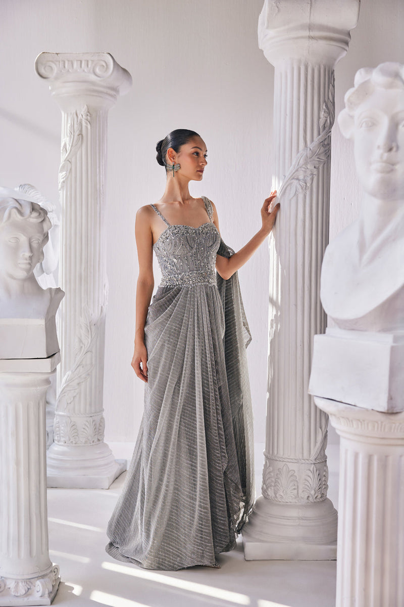 Ombre Draped Saree Gown In A Metallic Crinkle Fabric. It Is Constructed Witha Fitted Corset Bodice In Sequin And Beadwork.