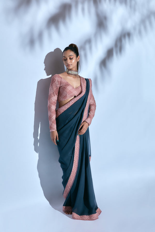 Teal Hand-embroidered Sari paired with Pink Hand-embroidered Blouse